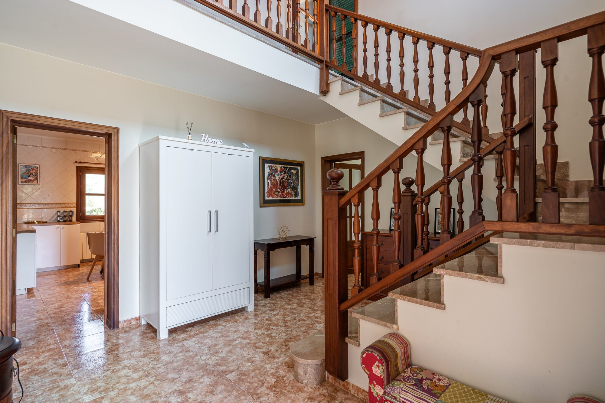 Entrance hall and wooden staircase