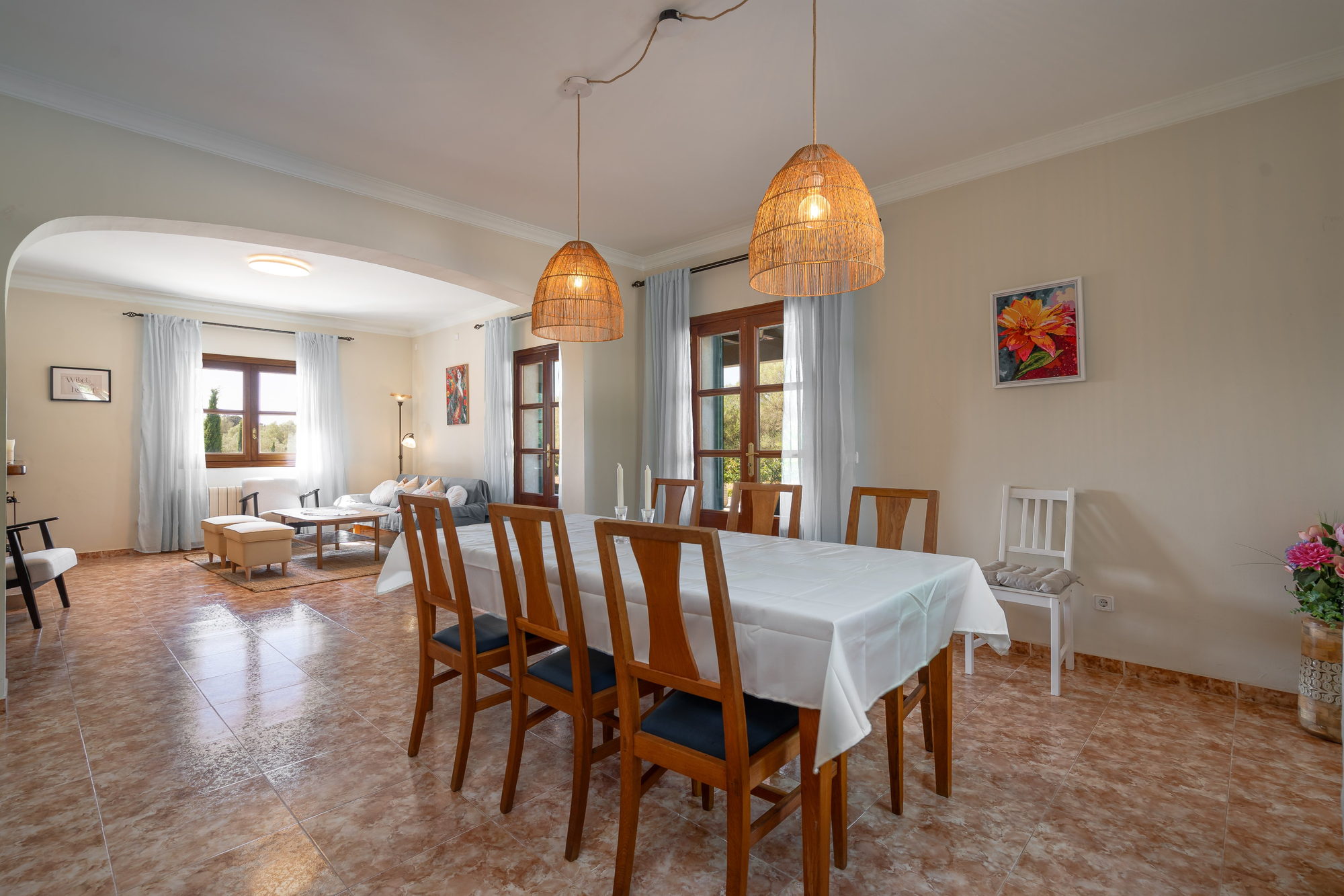 Dining table opening through to the living room